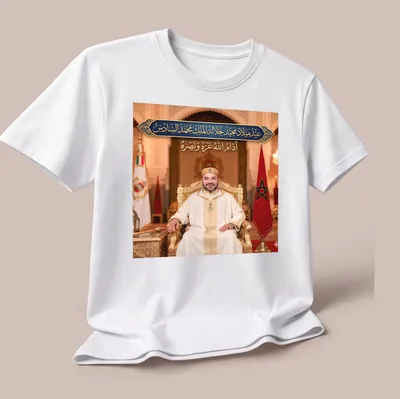 Elegant portrait of King Mohammed VI with celebratory text in gold and green — printed on a unisex t-shirt (angled view)