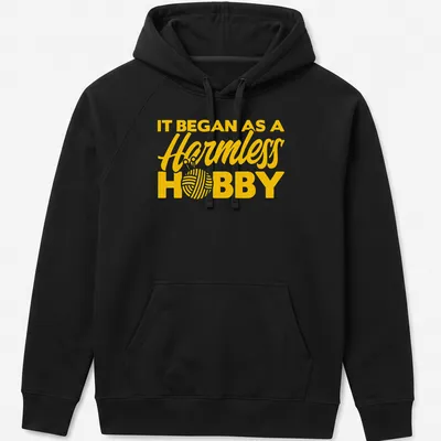 Bold typography Knitting Yarn t-shirt with a humorous slogan in yellow. — printed on a unisex hoodie