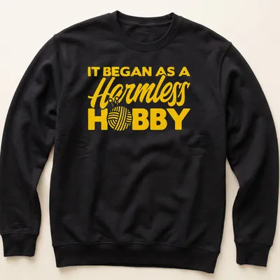 Bold typography Knitting Yarn t-shirt with a humorous slogan in yellow. — printed on a unisex sweatshirt