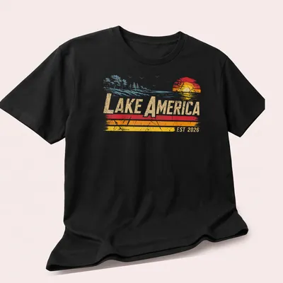 Retro sunset design with Lake America EST 2026 in vibrant colors — printed on a unisex t-shirt (angled view)
