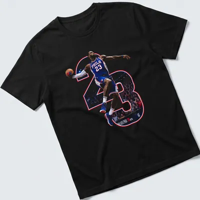 Dynamic illustration of LeBron James with 'PHILA 23' printed in blue, red, and white. — printed on a unisex t-shirt