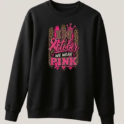 Bold typography and leopard print design with crown in pink and gold — printed on a unisex sweatshirt