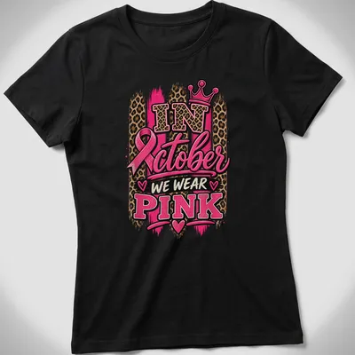 Bold typography and leopard print design with crown in pink and gold — printed on a women's shirt
