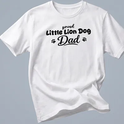 Bold typography t-shirt stating 'proud Little Lion Dog Dad' with playful Little Lion Dog illustration