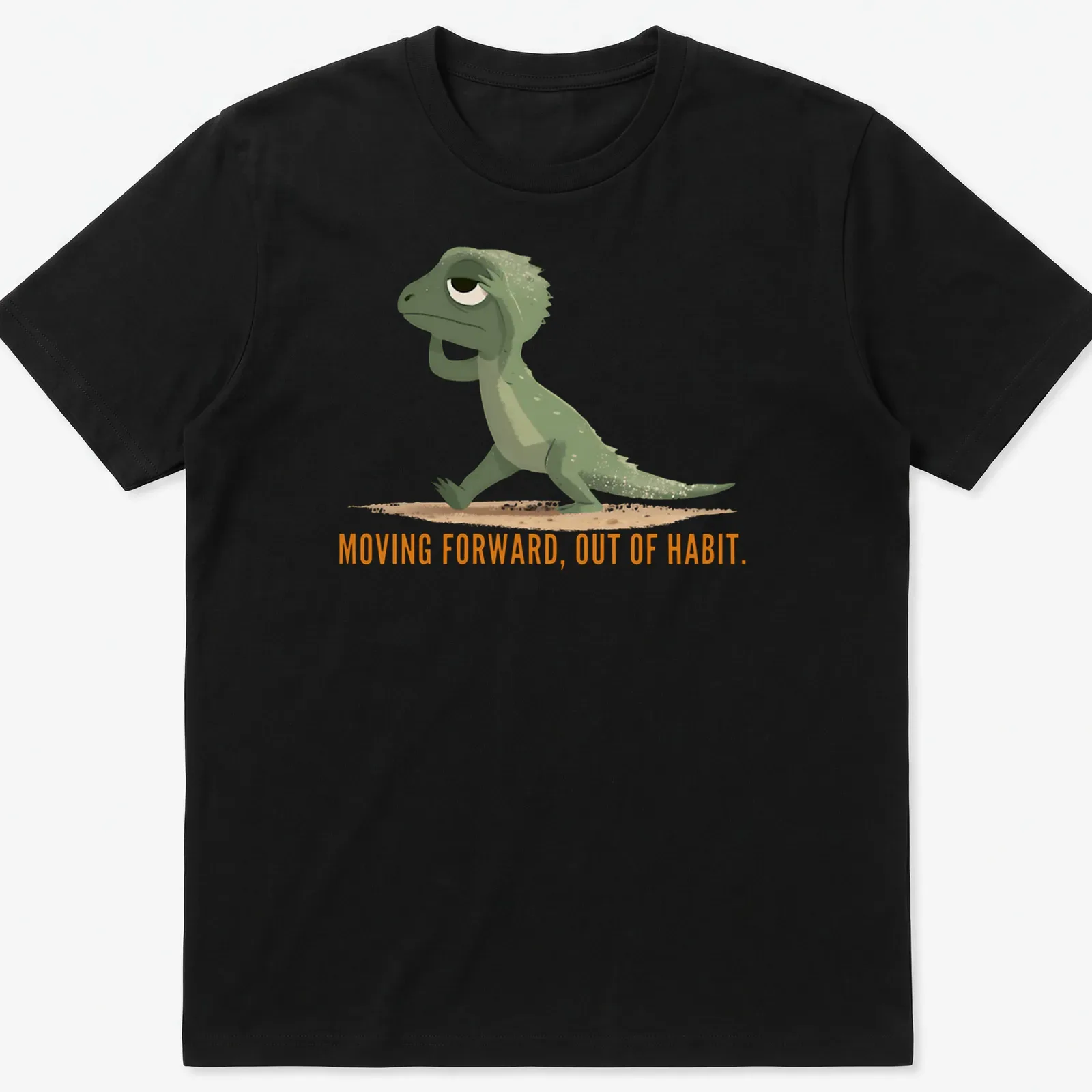 Cartoon lizard graphic with text about moving forward out of habit in green and orange — printed on a unisex t-shirt