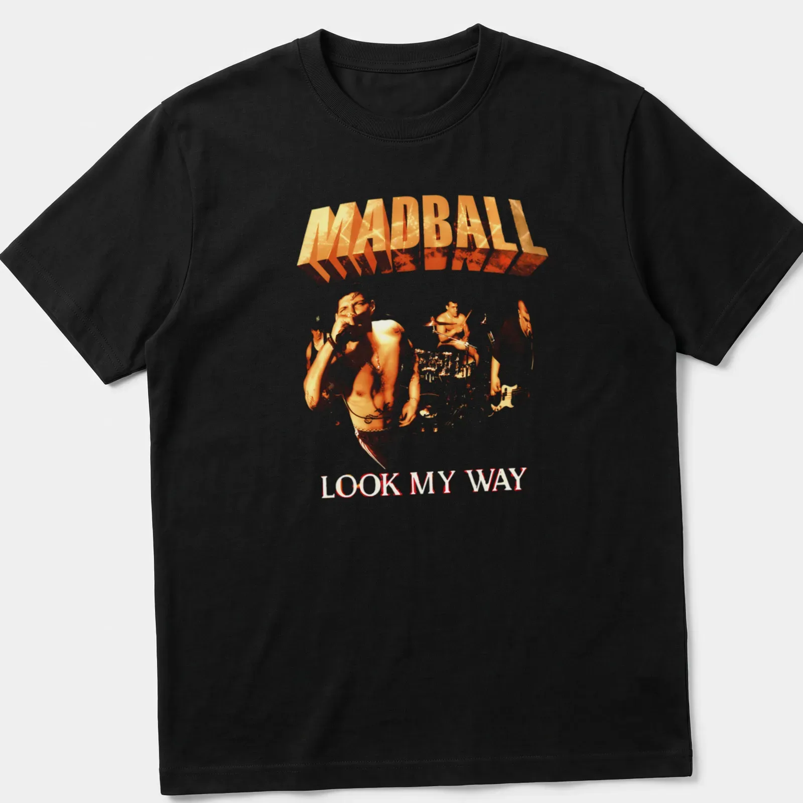 Bold graphic tee featuring Madball Look My Way text in orange and white — printed on a unisex t-shirt