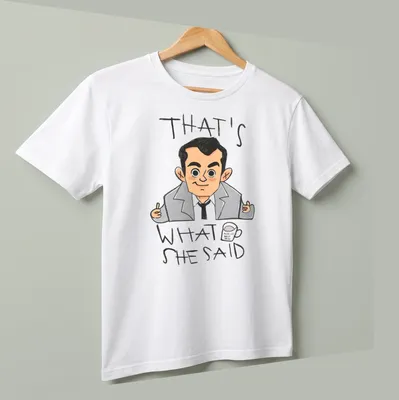 Cartoon illustration of Michael Scott with the text 'That's What She Said' in a humorous style. — printed on a unisex t-shirt (angled view)