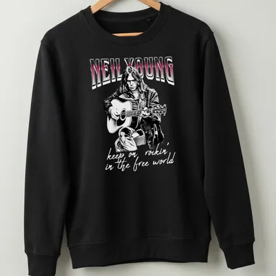 Black and white sketch of Neil Young with the text 'keep on rockin' in the free world' in red — printed on a unisex sweatshirt