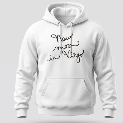 Handwritten script design reading 'New moon in Virgo' in black text — printed on a unisex hoodie