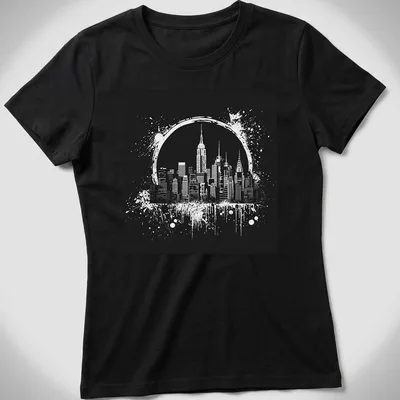 Ink splatter design of the New York City skyline in black and white — printed on a women's shirt