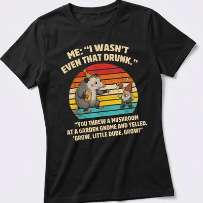 Whimsical illustration of an opossum and a garden gnome with humorous text. — printed on a women's shirt