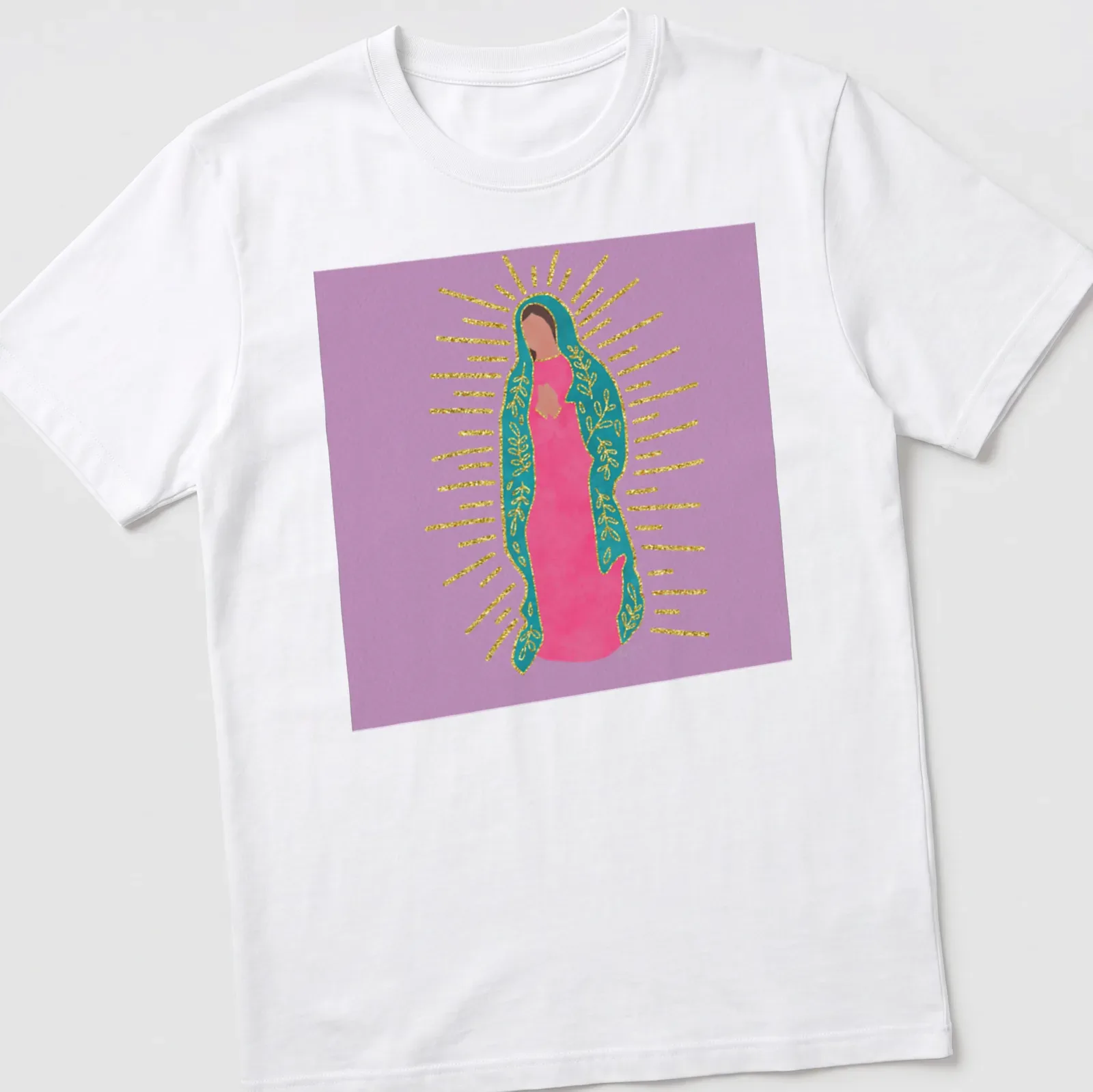 Colorful illustration of Our Lady Of Guadalupe in pink, teal, and gold — printed on a unisex t-shirt