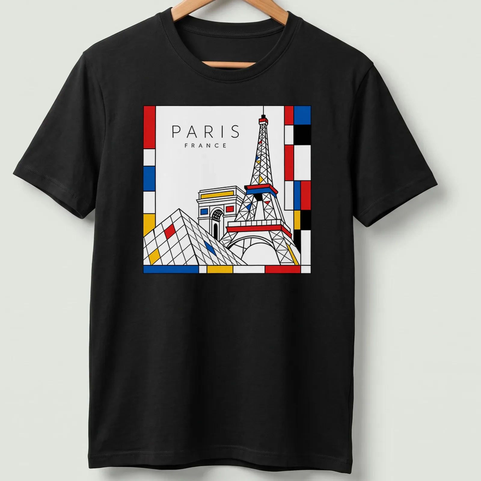 Illustration of Eiffel Tower and Pyramid in Mondrian style with bold colors — printed on a unisex t-shirt