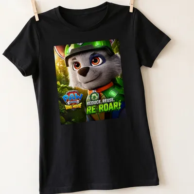 Colorful animated Paw Patrol T-shirt with dino theme and vibrant text — printed on a women's shirt