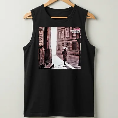 Vintage style shirt featuring a person in a trench coat labeled 'camel stationary traveller' — printed on a tank top