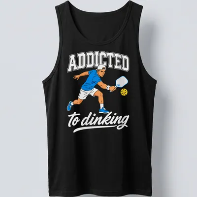 Bold printed text 'ADDICTED to dinking' with a Pickleball player design — printed on a tank top