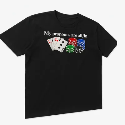 Realistic print of poker chips with the phrase My pronouns are all/in — printed on a unisex t-shirt (angled view)