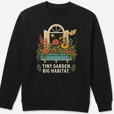 Vintage floral T-shirt featuring the text 'TINY GARDEN. BIG HABITAT.' with colorful flowers — printed on a unisex sweatshirt
