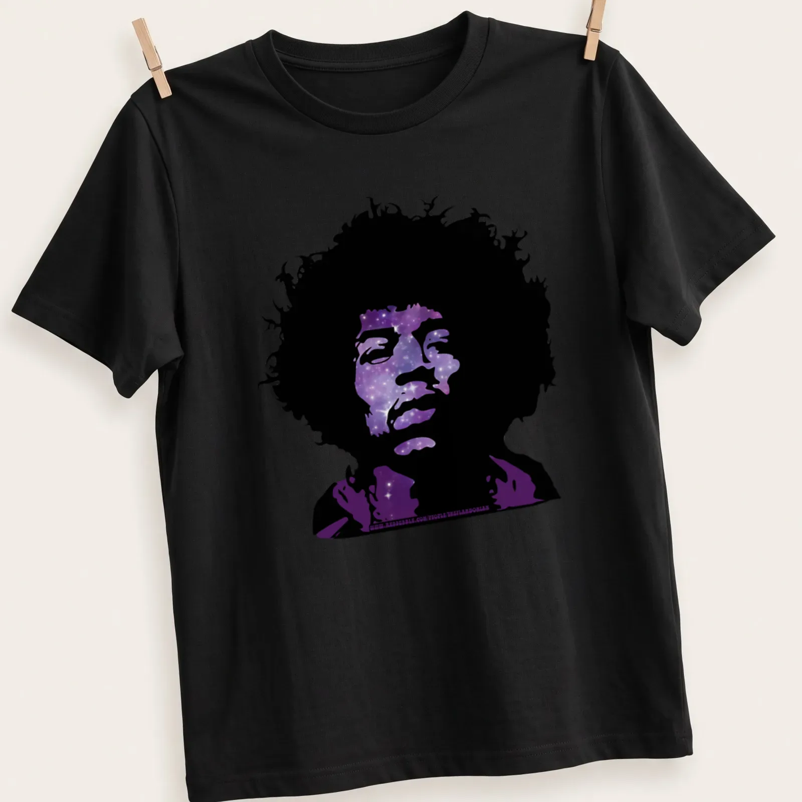 Psychedelic silhouette of a musical icon with galaxy pattern in purple and black — printed on a unisex t-shirt