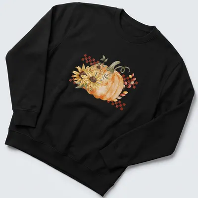 Boho style graphic of a pumpkin and sunflowers in warm autumn colors — printed on a unisex sweatshirt