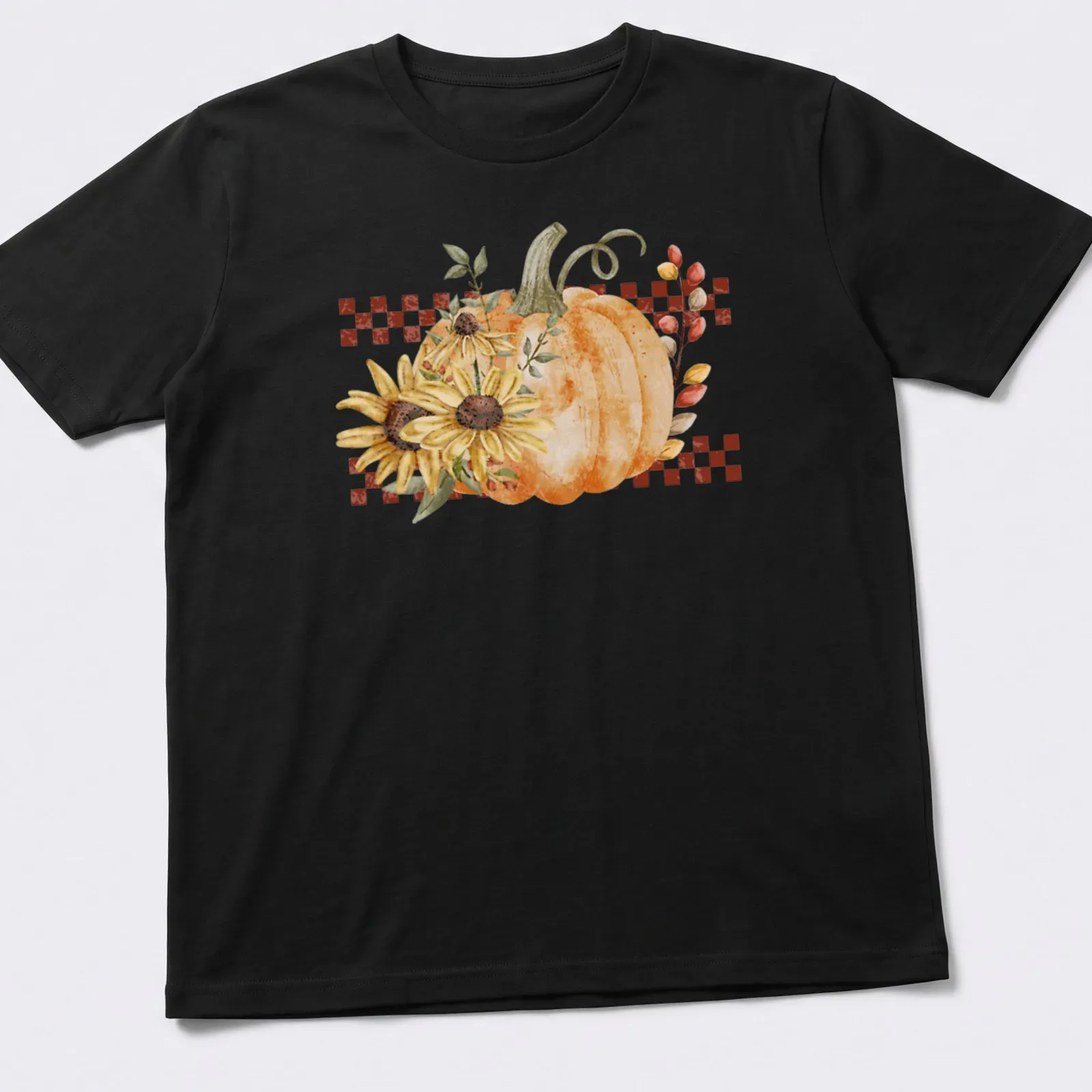 Boho style graphic of a pumpkin and sunflowers in warm autumn colors — printed on a unisex t-shirt