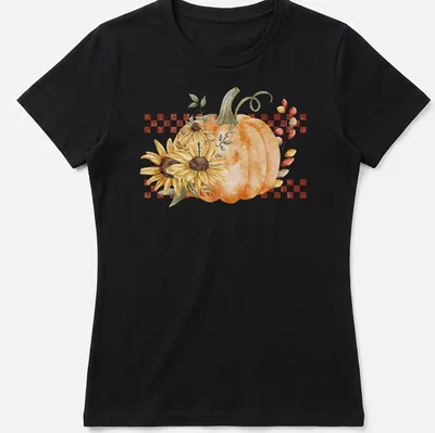 Boho style graphic of a pumpkin and sunflowers in warm autumn colors — printed on a women's shirt