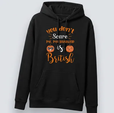 Kawaii pumpkin design with humorous text about a British husband. — printed on a unisex hoodie