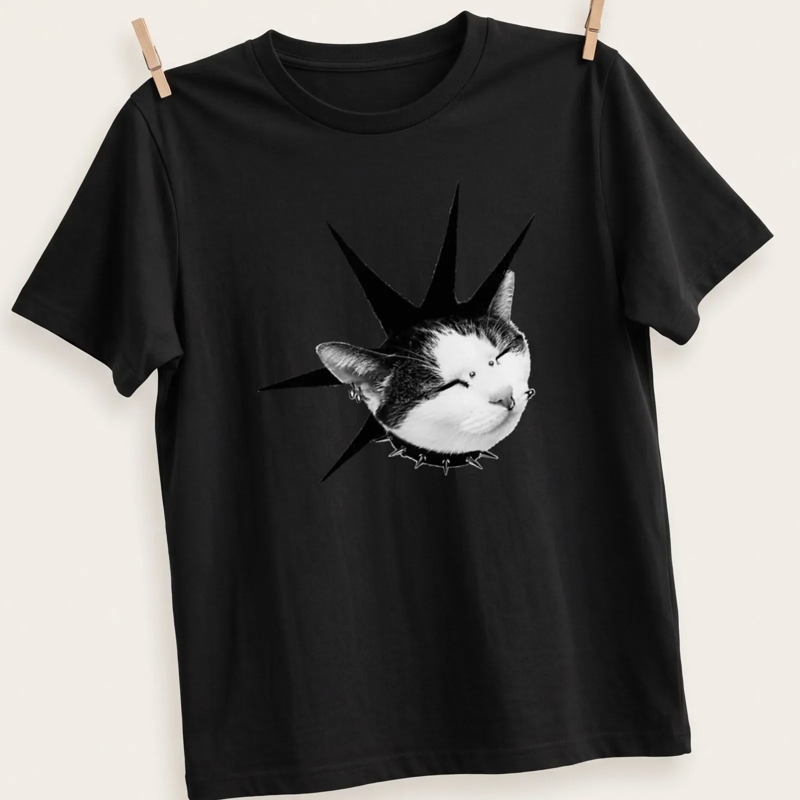 Punk rock cat illustration with spiky mohawk in black and white — printed on a unisex t-shirt