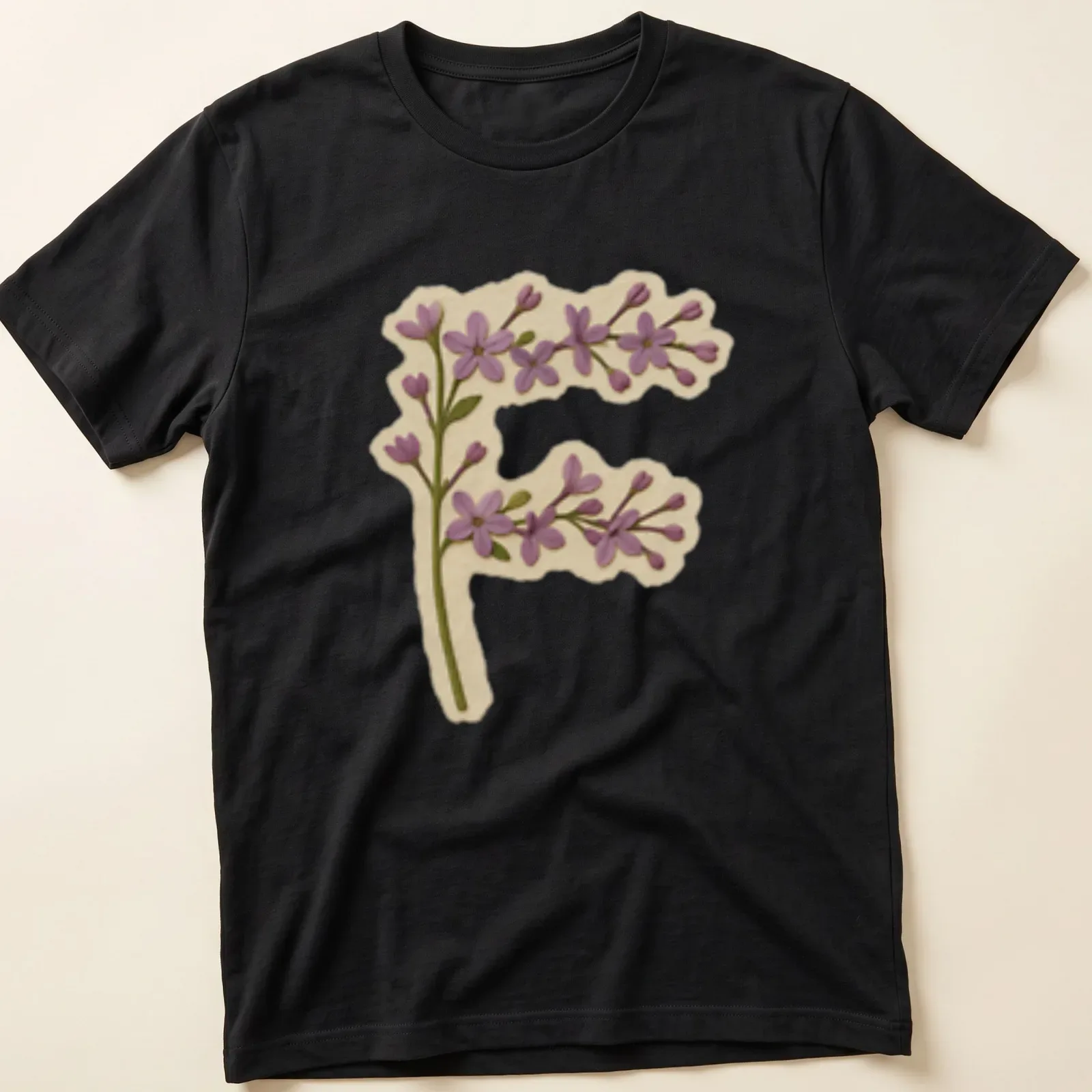 Vintage floral shirt featuring a large letter F adorned with purple lilac flowers. — printed on a unisex t-shirt