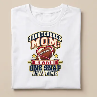 Bold, colorful text reads 'Quarterback Mom: Surviving One Snap at a Time' with football imagery