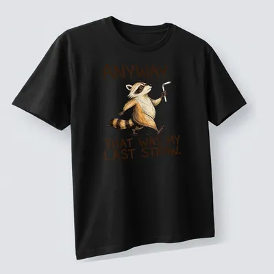 Cartoon raccoon with humorous text about a last straw. — printed on a unisex t-shirt (angled view)
