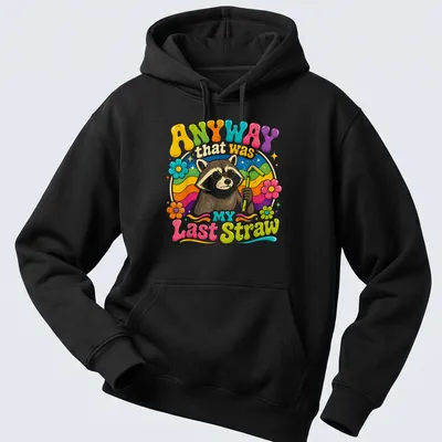 Colorful cartoon raccoon holding a straw with humorous text above. — printed on a unisex hoodie