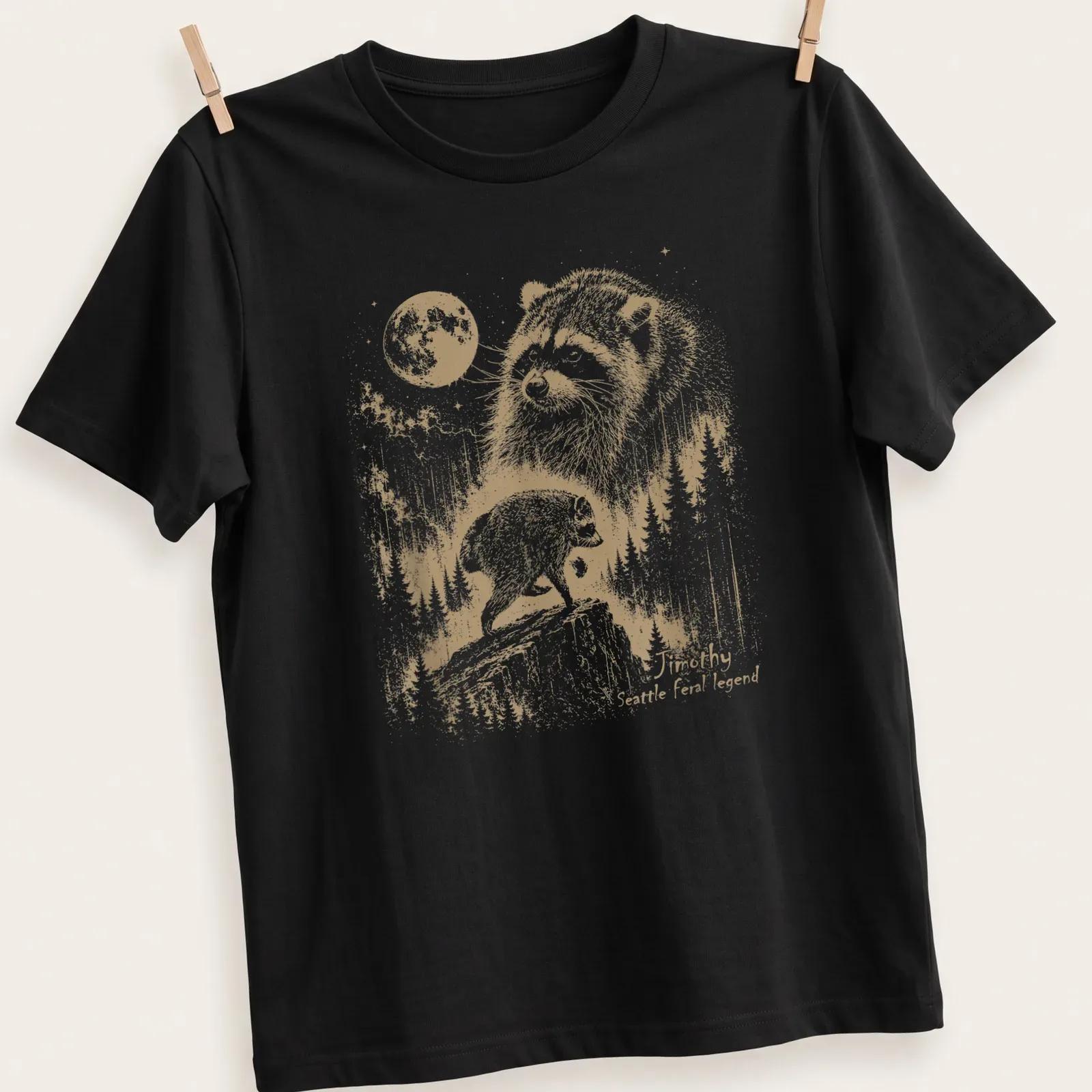 Vintage illustration of a raccoon with text reading Timothy Seattle feral legend — printed on a unisex t-shirt