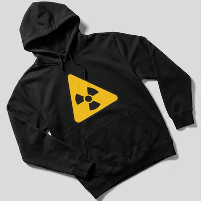 Yellow radioactive symbol graphic on a black — printed on a unisex hoodie