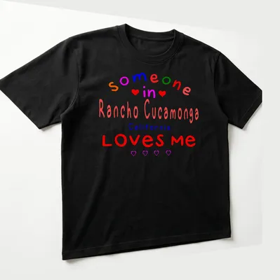 Colorful shirt featuring playful text about Rancho Cucamonga love — printed on a unisex t-shirt (angled view)