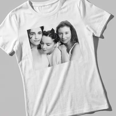 Black and white portrait of Bjork, PJ Harvey, and Tori Amos on — printed on a women's shirt