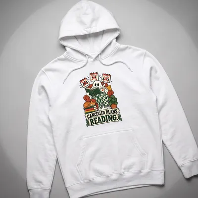 Whimsical ghost reading a book with text 'CANCELLED PLANS. READING.' in playful design — printed on a unisex hoodie