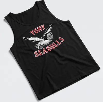 Bold graphic tee featuring seagulls with a man's face and playful slogan — printed on a tank top