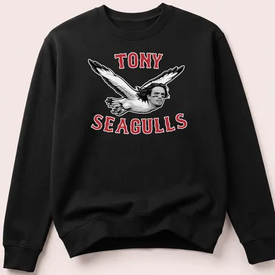 Bold graphic tee featuring seagulls with a man's face and playful slogan — printed on a unisex sweatshirt