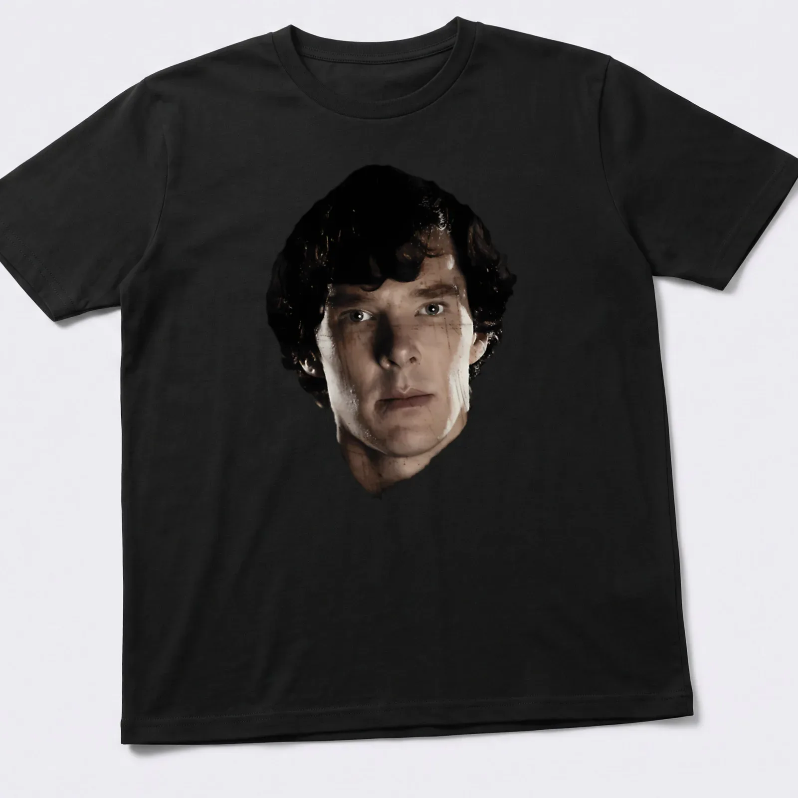 Realistic portrait of Sherlock Holmes in black and white with skin tone details — printed on a unisex t-shirt