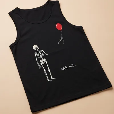 Cartoon skeleton holding a red balloon with the text 'Well, shit...' — printed on a tank top