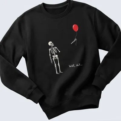Cartoon skeleton holding a red balloon with the text 'Well, shit...' — printed on a unisex sweatshirt