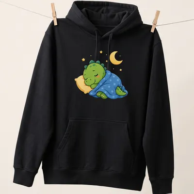 Kawaii sleeping dinosaur graphic in green, blue, and yellow tones — printed on a unisex hoodie
