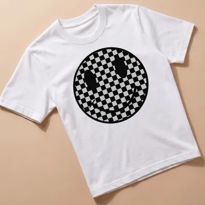 Checkerboard pattern featuring a playful smiley face in black and grey