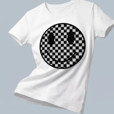 Checkerboard pattern featuring a playful smiley face in black and grey — printed on a women's shirt