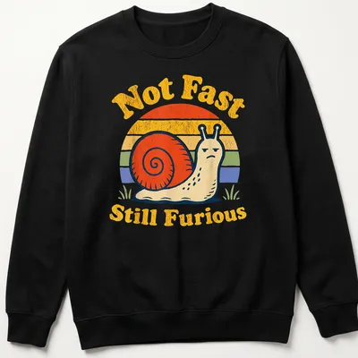 Retro vintage snail design with the phrase Not Fast Still Furious in bright colors — printed on a unisex sweatshirt