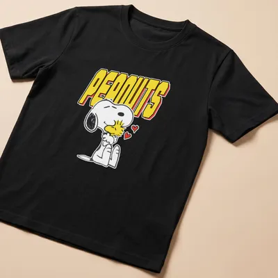 Cartoon illustration of Snoopy and Woodstock with PEANUTS text in bold letters