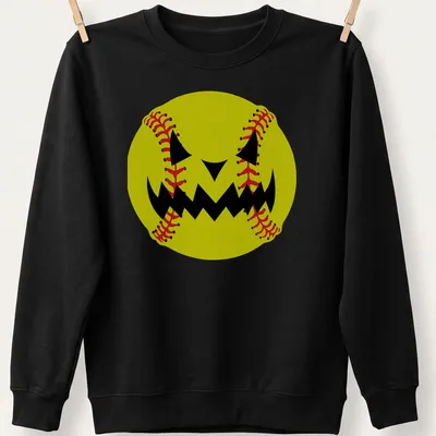 Cartoon pumpkin jack-o'-lantern face resembling a softball in yellow, black, and red — printed on a unisex sweatshirt