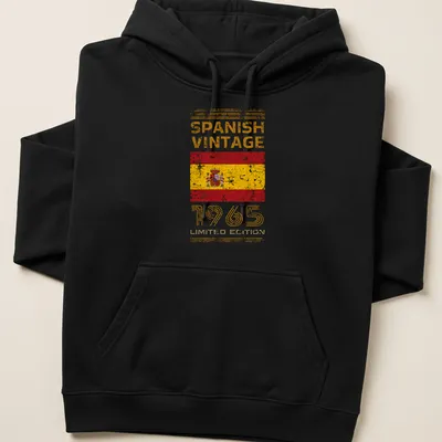 Vintage distressed Spanish flag T-shirt with bold text celebrating 1965 edition — printed on a unisex hoodie