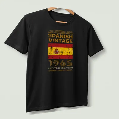Vintage distressed Spanish flag T-shirt with bold text celebrating 1965 edition — printed on a unisex t-shirt (angled view)